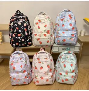 Collection of casual strawberry print backpacks in six vibrant colors for school and travel