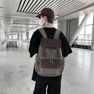 Mochila de lona vintage con correas de cuero y cierre de cordón para viaje y ocio