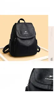Detailed view of black litchi grain leather backpack with durable stitching and logo