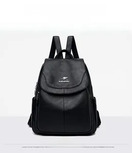 Front view of black pebble-textured leather backpack with silver metallic kangaroo emblem