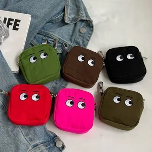 Bolsos plegables de monstruo con bordado de ojos coloridos y ganchos de metal en seis colores