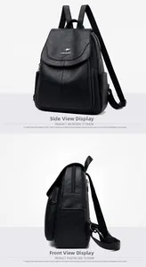 Detailed side view of black faux leather backpack with litchi texture and silver logo