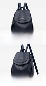 Detail view of the blue faux leather texture and kangaroo logo on the backpack