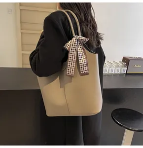 Litchi pattern leather tote bag in khaki finish with stylish plaid scarf detail