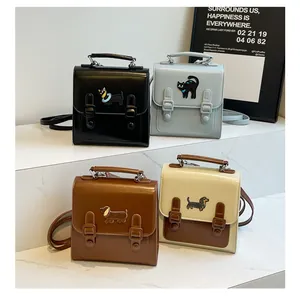 Detail showing four retro aesthetic crossbody bags with cute animal embroidery and buckles