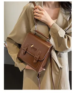 Brown vintage style satchel with cute dachshund embroidery and double buckle closure