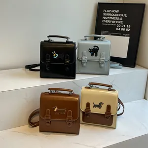Mini PU leather backpacks in four colors with animal embroidery and flap buckle design