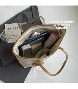 Detailed view of the checkered tote bag interior showing ample storage and compartments