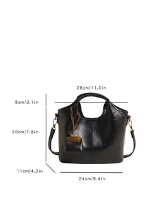 Minimalist black bucket bag with a small pouch, 28x20x11cm dimensions on white background