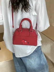 Minimalistische rote Baguette-Tasche mit Stickerei und abnehmbarem Riemen für Damen
