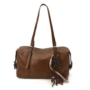 Large dark brown oil wax leather Boston bag with a cute puppy and chocolate charm
