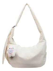 Minimalist beige moon-shaped padded tote bag with cute plush bunny charm detail