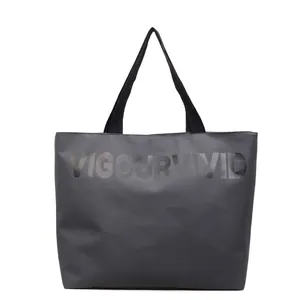 Black canvas tote bag with VIGOURVIVID text for daily commute and work professional use