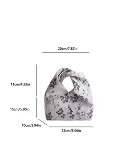 Sac seau minimaliste en tissu gris à fleurs avec anse nouée et dimensions du sac