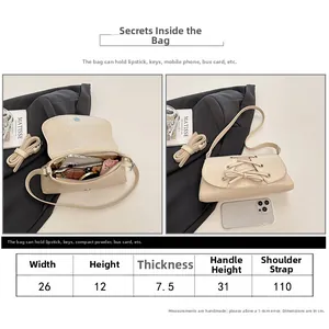 Size chart for beige pleated baguette bag showing dimensions and interior capacity detail