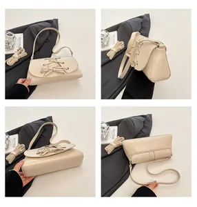 Detailed four-way views of cream crossbody bag with bow tie and adjustable strap