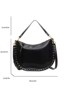 Retro black leather crescent tote bag with gold rivet studs and product dimensions
