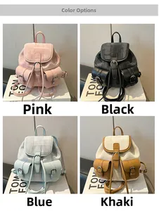 Mini multi-pocket backpack detail in pink, black, blue and khaki canvas finish