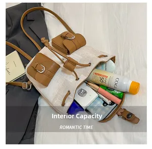 Internal capacity of canvas backpack showing storage for cosmetics and daily items