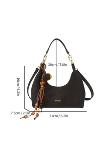 Dark brown faux suede crescent hobo bag with tassel detail and size dimensions