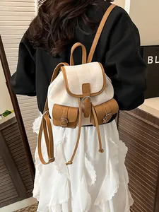 Retro canvas mini backpack in beige and brown leather with metal buckle pockets