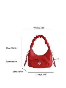 Red ruched dumpling handbag with heart pendant and leather-woven chain shoulder strap