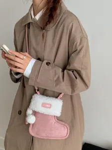 Sac bandoulière en daim rose avec bordure en polaire blanche et logo cœur pour femme