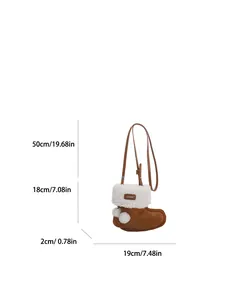 Mini sac à bandoulière marron en daim en forme de botte avec fausse fourrure et pompons