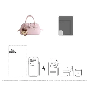 Pink shell tote bag with bear charm showing internal capacity for daily essentials