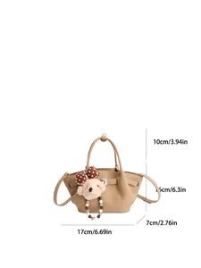 Lychee grain leather bucket bag in khaki with plush bear charm and size measurements