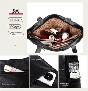 Macro view of soft lychee pattern leather tote bag with functional multi-pocket compartments
