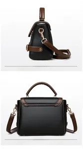 Detail of large tote bag with black lychee grain leather and gold hardware accents