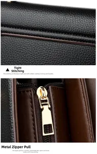 Detail of black litchi leather texture with precise stitching and gold metal zipper
