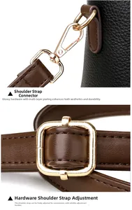Detail of black lychee leather bag featuring adjustable brown strap with gold hardware