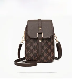 Front view of a brown monogram mini shoulder bag with gold metal clasp and NK logo