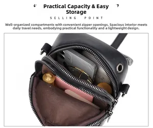 Detail view of black crossbody phone bag with two zipper compartments and large capacity