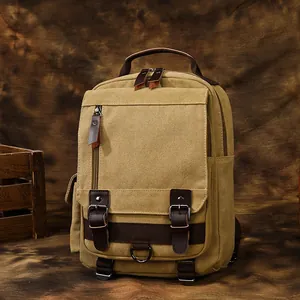 Zaino vintage da uomo in tela giallo kaki con inserti in pelle marrone e multitasche capiente