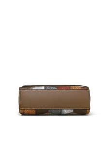 Detailed bottom view of the patchwork leather crossbody bag showing fine stitching and textures