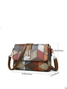 Detailed view of color-block patchwork crossbody bag with dimensions 21x15x8 cm