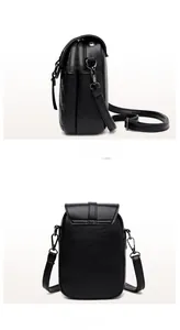 Detail of black mini crossbody bag featuring quilted lattice pattern and dual zippers