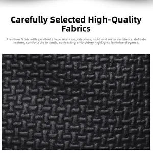 Close-up of waterproof synthetic leather backpack fabric with durable texture and contrast stitching