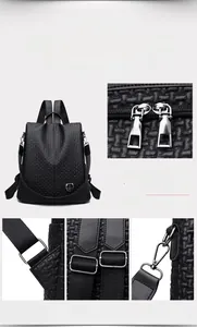 Detail view of black woven texture leather backpack with shiny silver metal hardware
