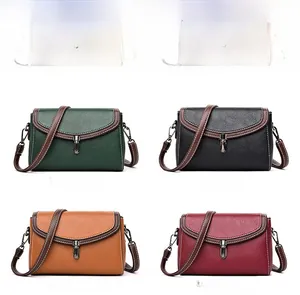 Detailed grid view showing leather textures in green, black, yellow, and claret shoulder bags