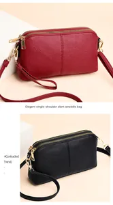 Detail of three-layered zipper compartments on lychee grain leather crossbody bags