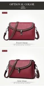 Macro view of wine red lychee leather bag with white contrast stitching and metal buckle