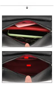 Vue détaillée du sac en cuir noir montrant la doublure rouge et les compartiments