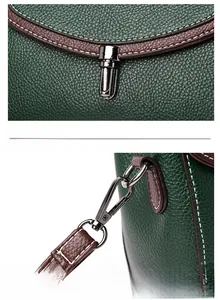 Close-up of metal twist lock and detachable strap hook on dark green leather bag