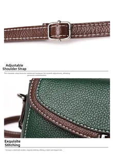 Detail of green grain leather bag with contrast white stitching and metal buckle