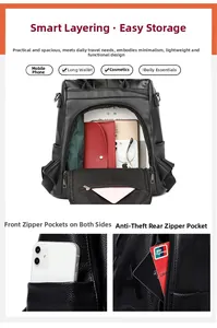 Detailed view of black litchi texture leather backpack with organized compartments