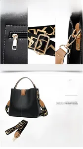 Detail of black pebbled leather bucket bag featuring a back zipper pocket and wide strap